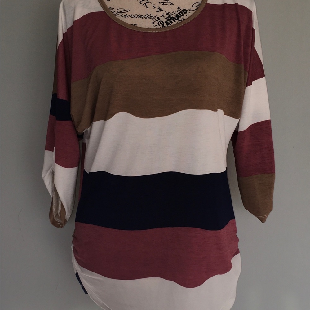 Ashley Blue top. Sz Med wavy stripe colors.